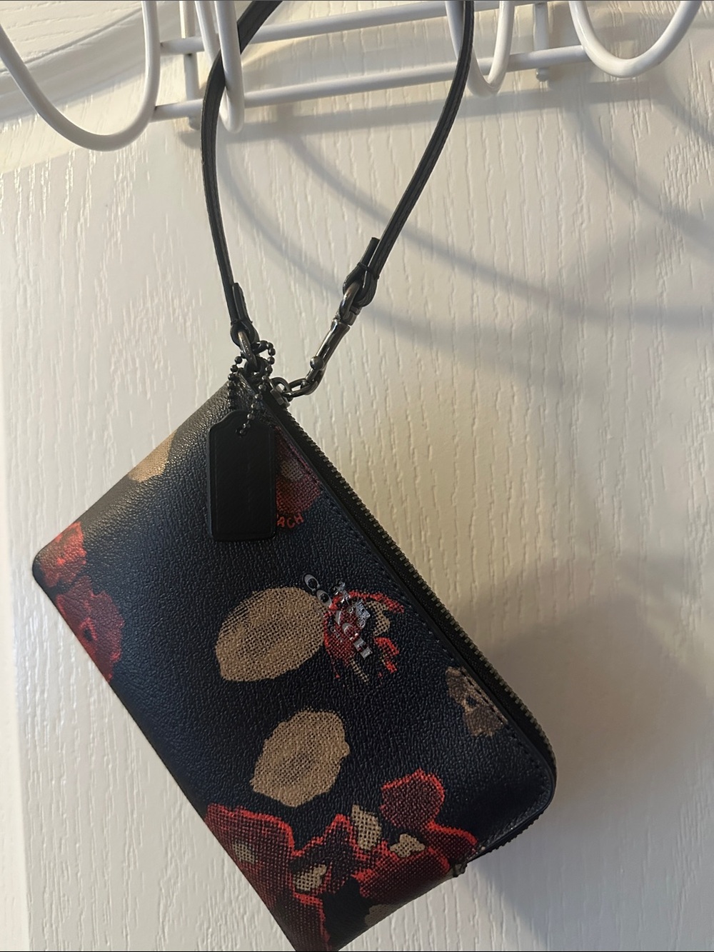 Coach Black Floral Zip Wristlet with Floral Red and Tan Accents